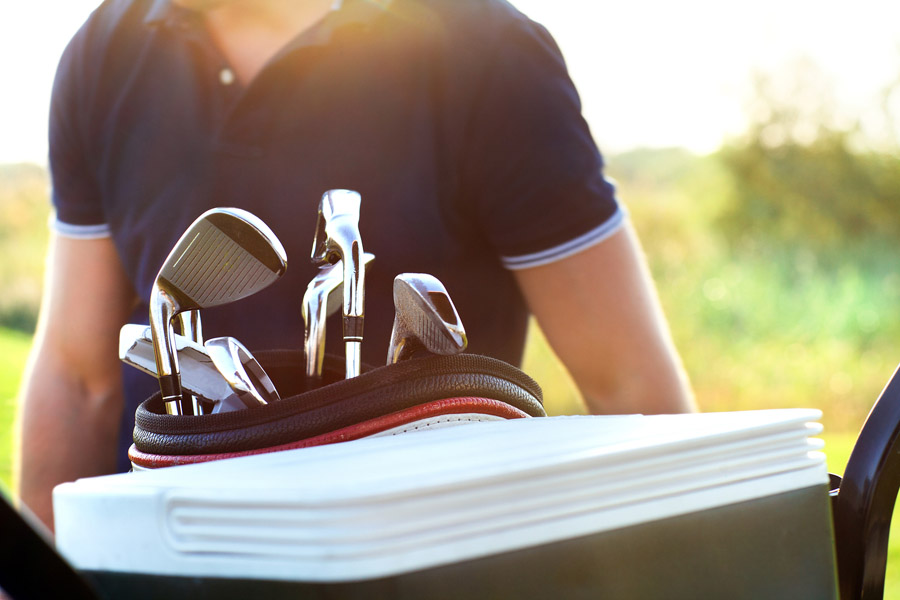 Close Up Of Professional Golf Gear On The Golf Course At Sunset