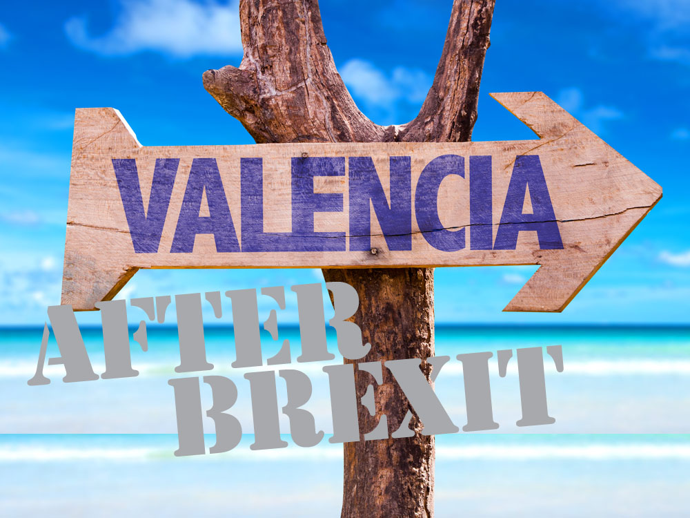 Valencia wooden sign with beach background