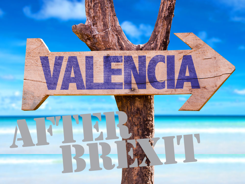 Valencia wooden sign with beach background